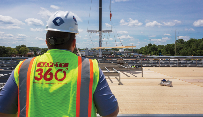 Structure Tone construction worker overseeing the mass timber project for L'Oreal's Research & Innovation Center in New Jersey.