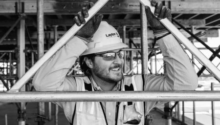 Black and white photo of Layton employee on a construction jobsite