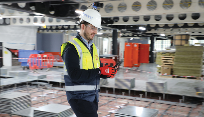 Construction employee using OpenSpace Reality Capture Toll on their phone