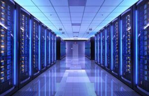 A long hallway lined with rows of servers, showcasing a modern data center environment.