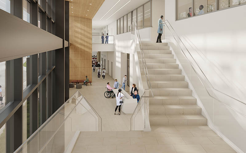 Digital rendering of the spacious inside with large stairway to the second floor with open view and balcony wood accents and white interior Florida State University Academic Health Center Built by Ajax Building Company