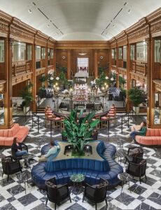 Revitalizing a Seattle Icon Large lounge area with a 360 bar in the center.