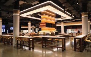 The Art of Building Food Halls Food hall with multiple areas of seating