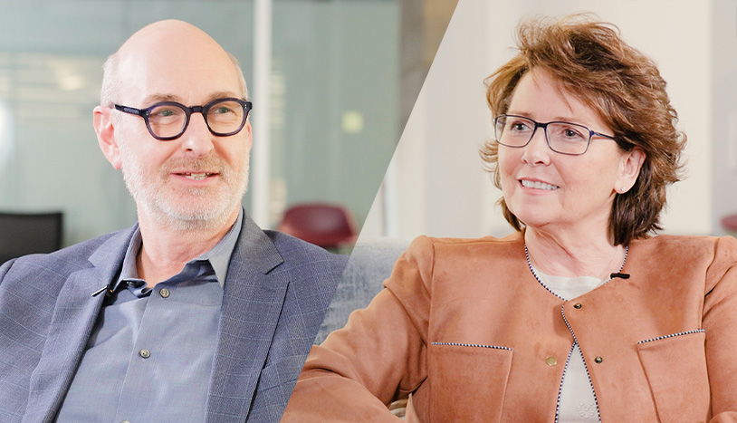 Rob Leon of STOBG and Ellen Giuntini of Otto Tech Systems speak during a podcast interview in a modern office setting.