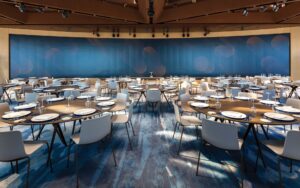 Setting the Standard: Quality at the Top of JPMorgan Chase’s NYC Headquarters Large dining area with multiple tables and chairs.