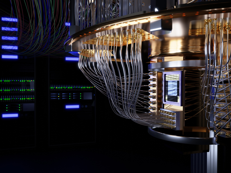 Metallic computing hardware with bundled cables beside illuminated server cabinets.