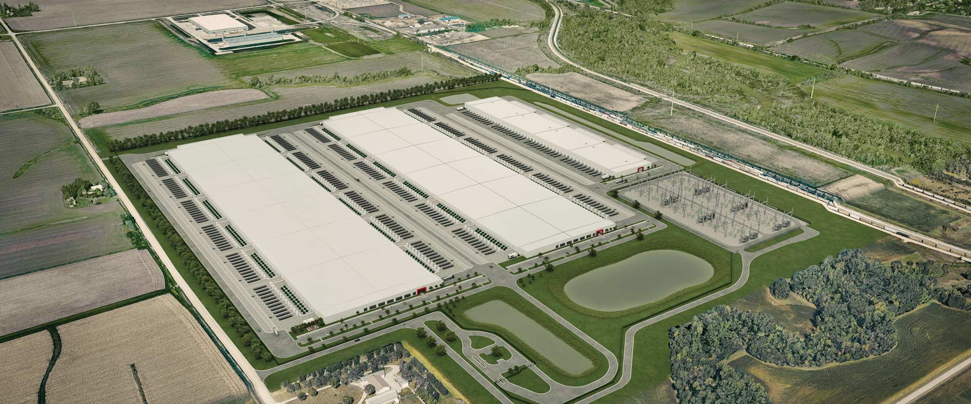 Aerial rendering of three large industrial buildings with adjacent equipment rows, an electrical substation, two ponds, access roads, and surrounding farmland.