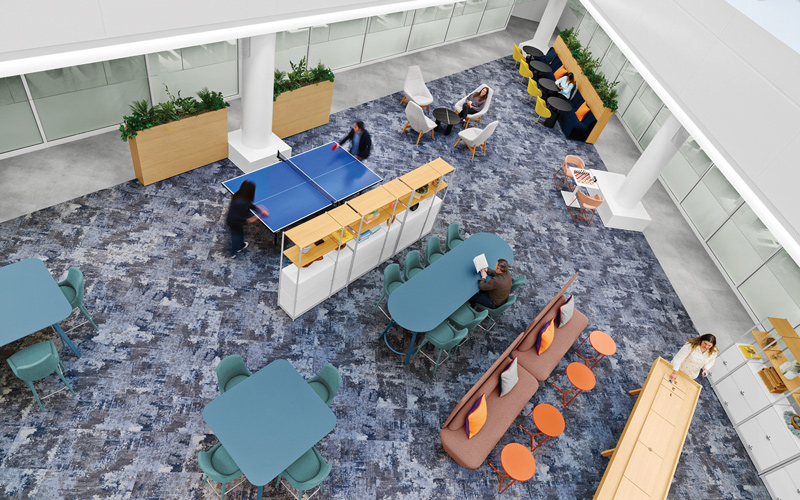 Overhead view of a workplace commons with table tennis, assorted seating and tables, planters, and several people.